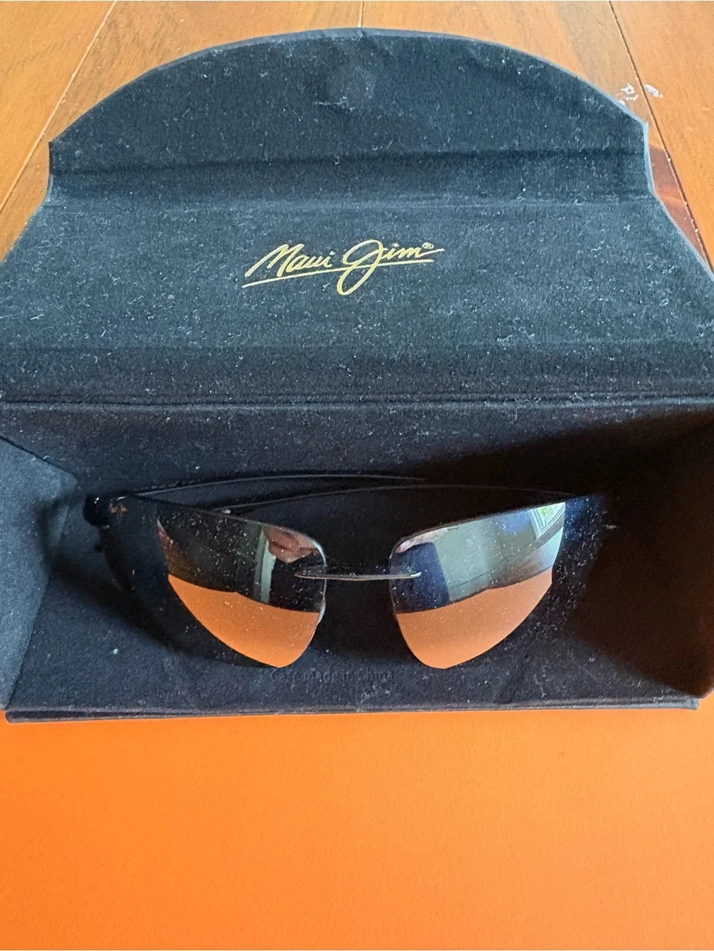 Maui Jim Black Rimless Sunglasses with Brown Lenses